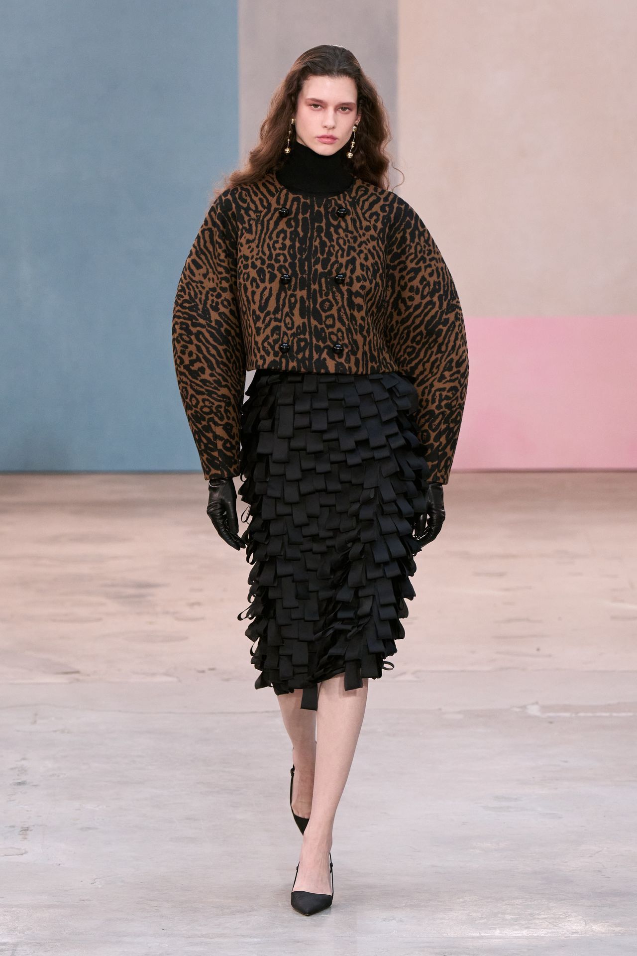 Image may contain Kim Cloutier Clothing Dress Adult Person Glove Long Sleeve Sleeve Fashion Knitwear and Sweater