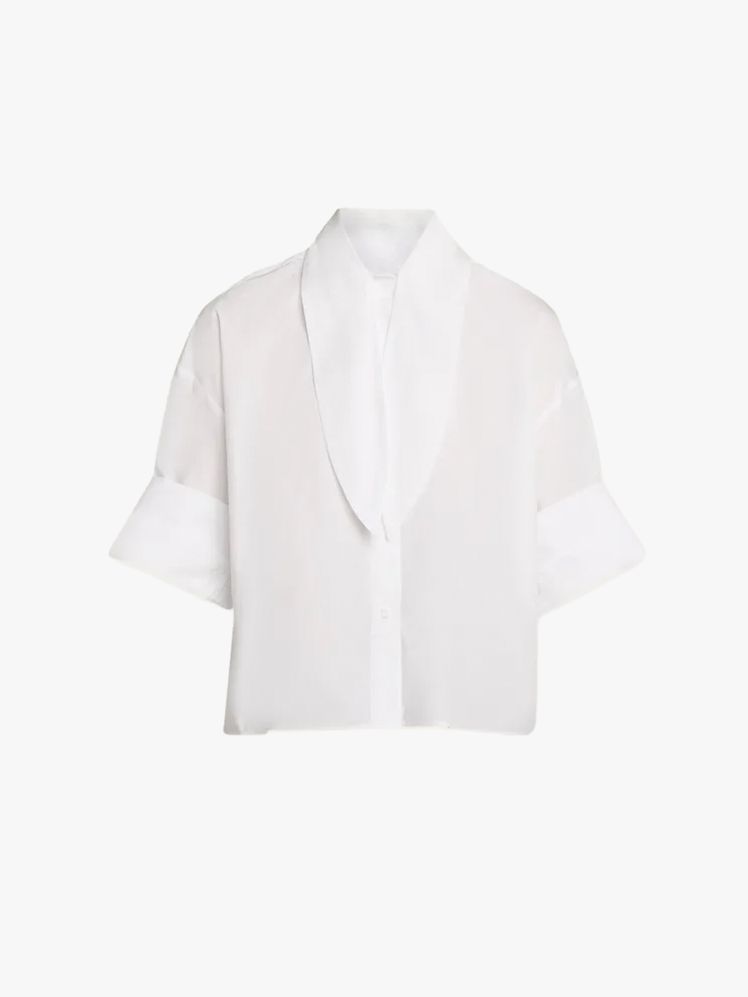 Image may contain Clothing Shirt Blouse Formal Wear and Suit