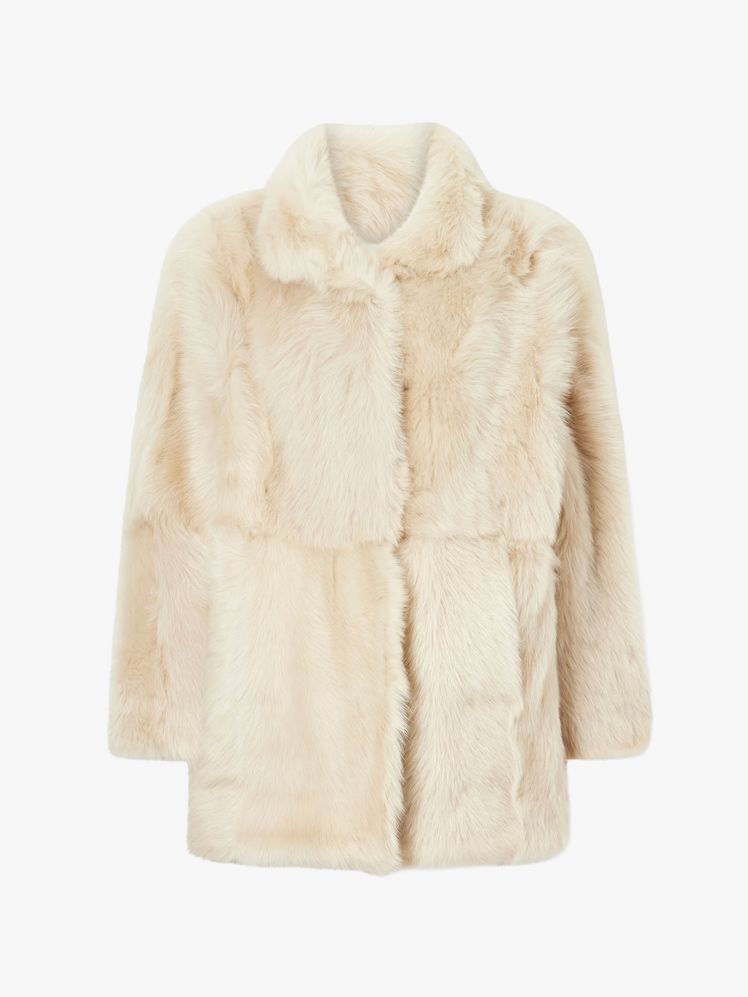 Image may contain: Clothing, Coat, and Fur