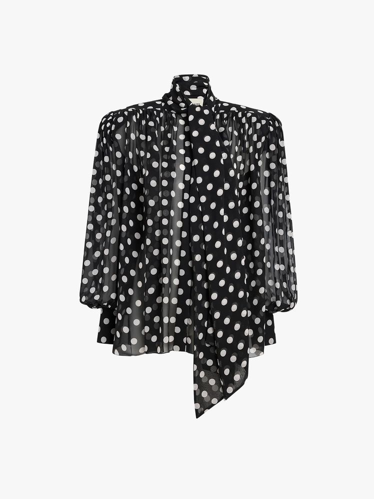 Image may contain Blouse Clothing Coat and Pattern