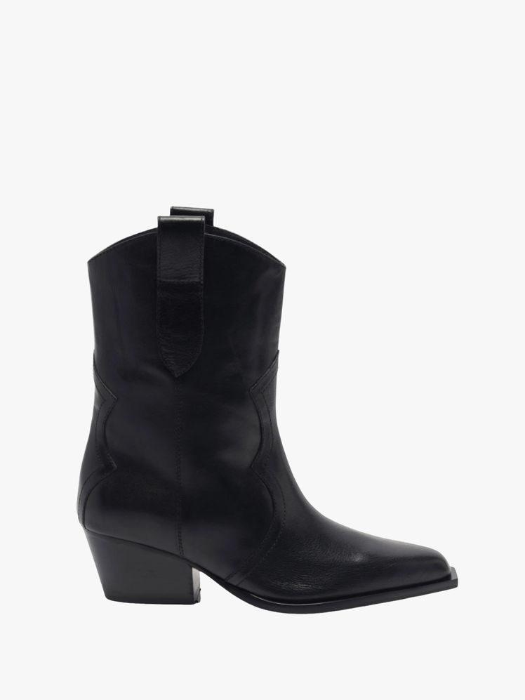 Image may contain: Clothing, Footwear, Shoe, and Boot